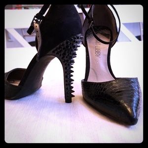 Spike heel black pumps